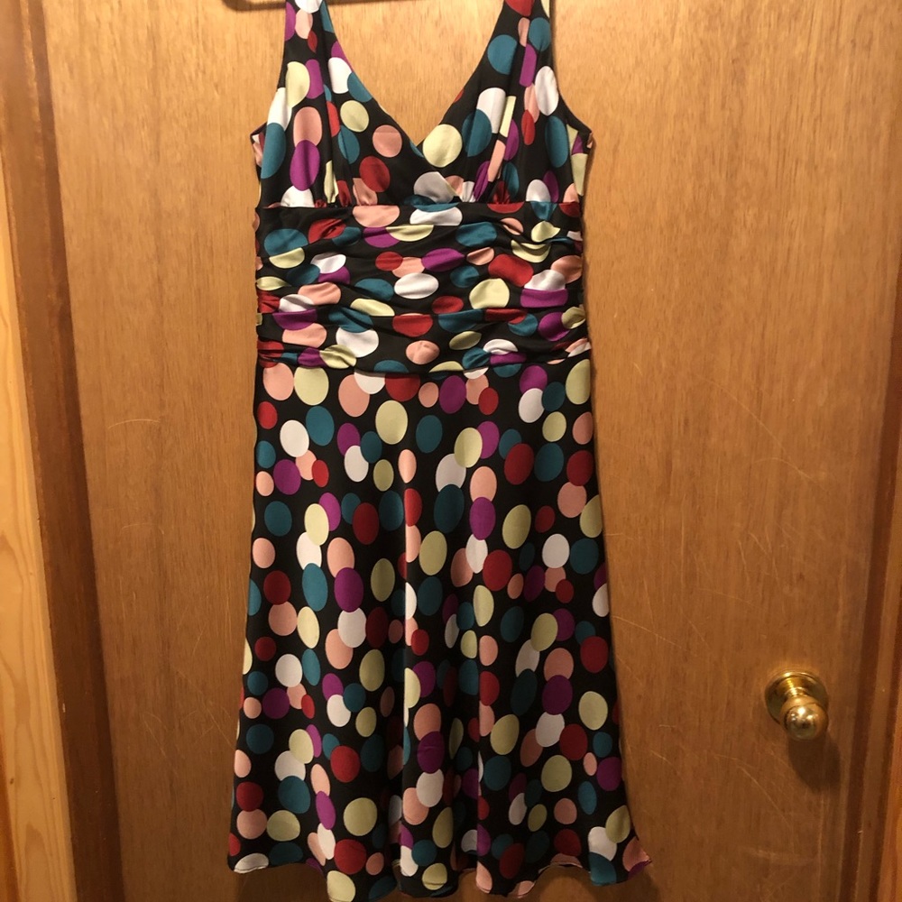 100% silk dress, fully lined. Fun party dress.